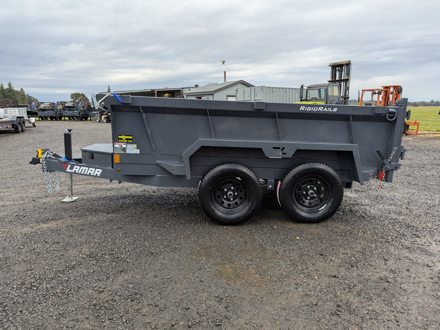 New 2026 LAMAR TRAILERS 60" x 10' - 7K Dump Trailer 24" SIDES