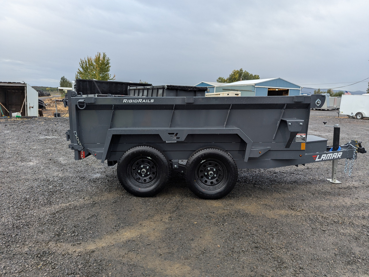 New 2026 LAMAR TRAILERS 60" x 10' - 7K Dump Trailer 24" SIDES