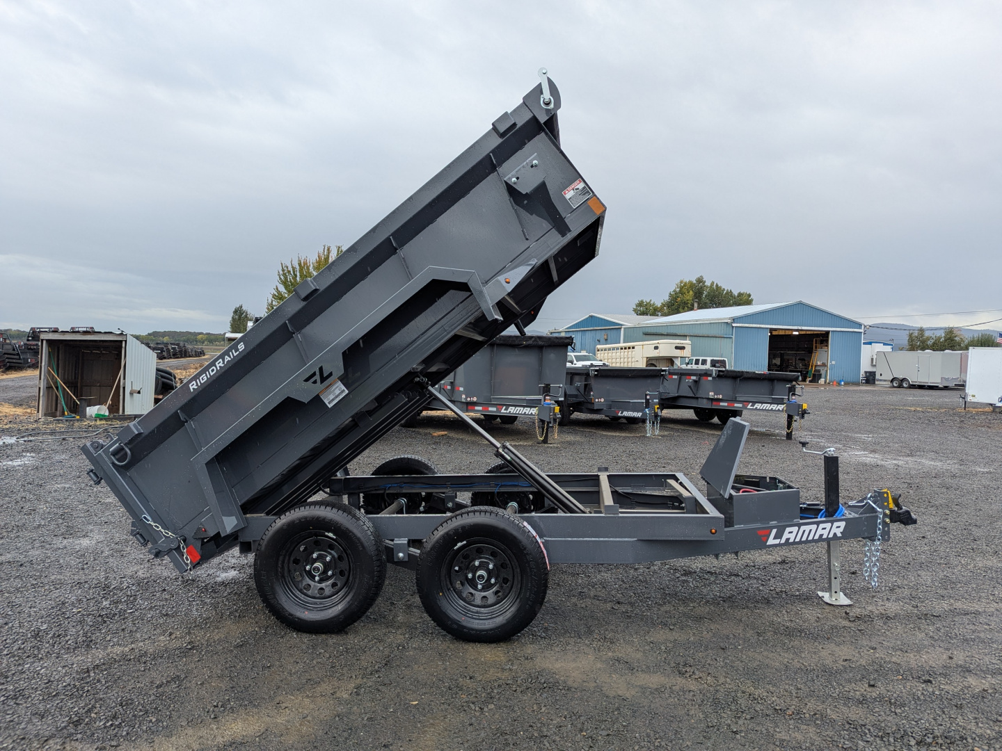 New 2026 LAMAR TRAILERS 60" x 10' - 7K Dump Trailer 24" SIDES
