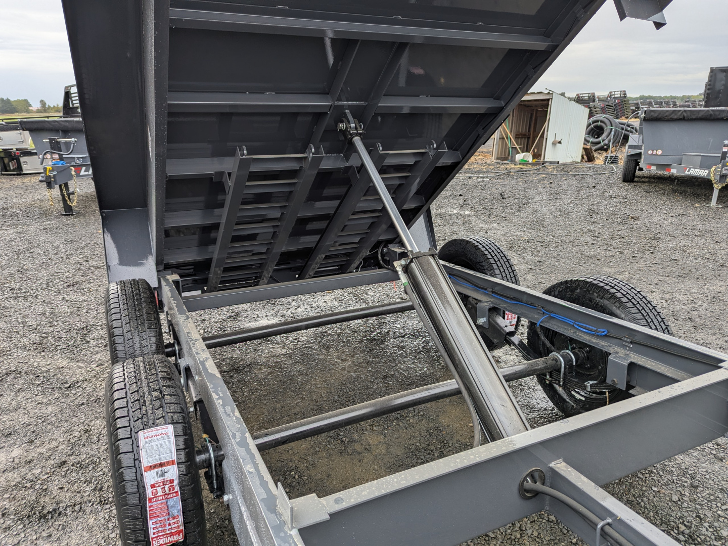 New 2026 LAMAR TRAILERS 60" x 10' - 7K Dump Trailer 24" SIDES