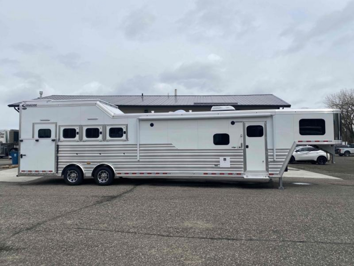 New 2023 Cimarron 4 Horse Side Load with 14'9" Living Quarter Trailer