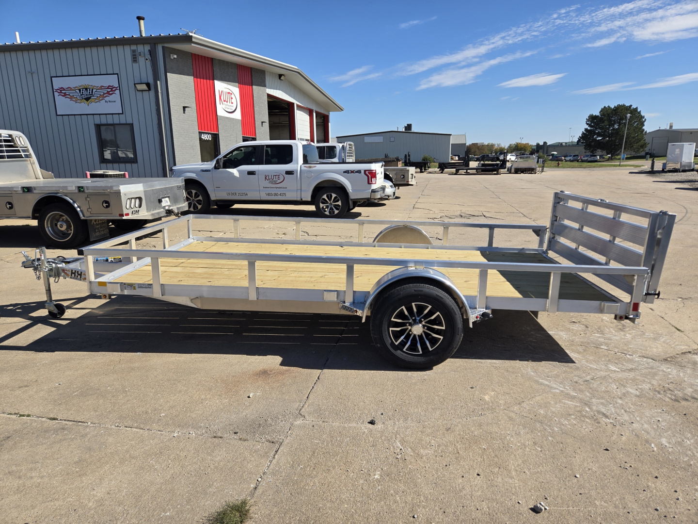 New 2026 H&H Trailers 82x14 Aluminum Rail Side 5K Utility Trailer