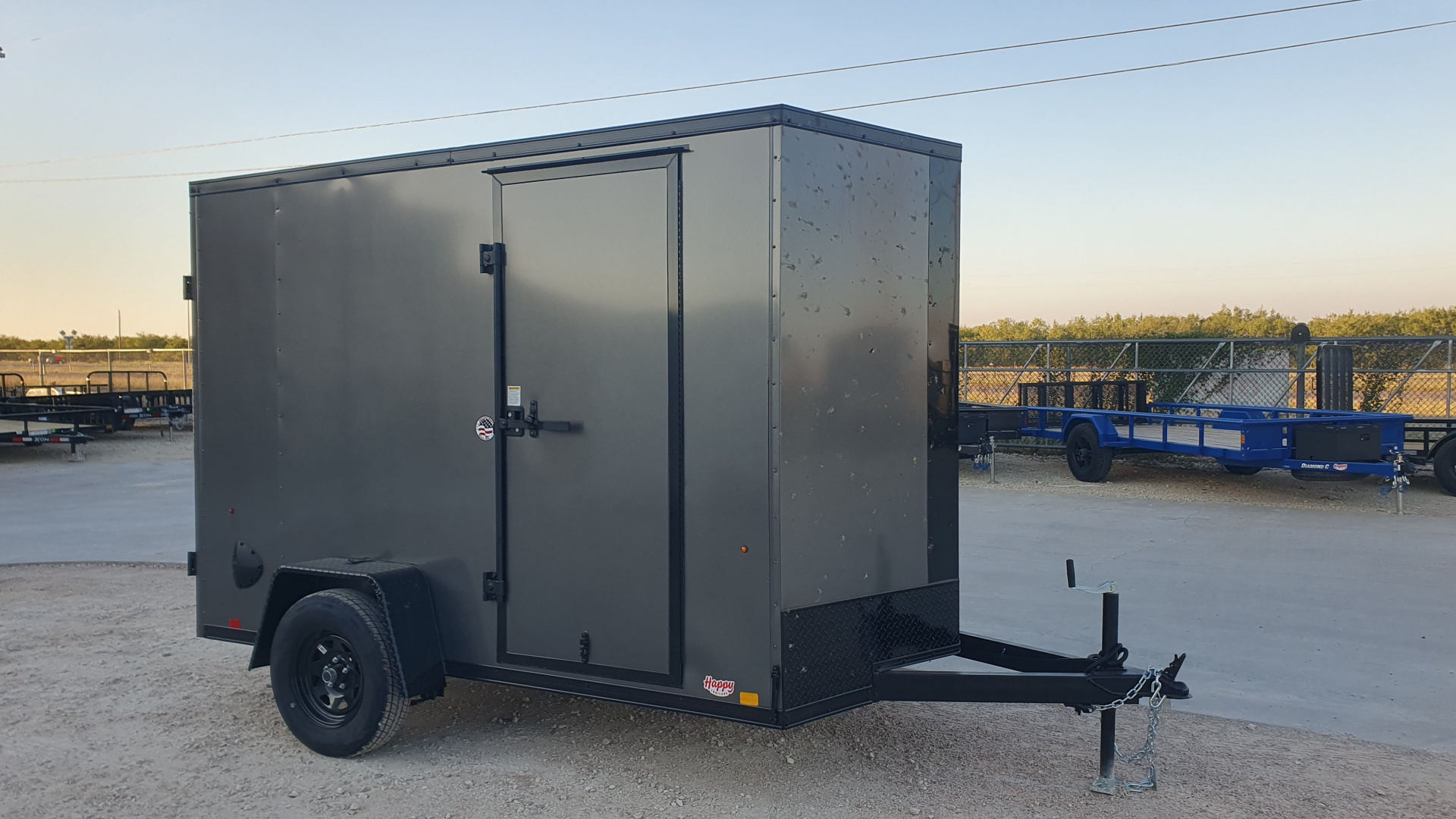 New 2026 Compass 6'x10' Enclosed Cargo Trailer - Indigo DLX