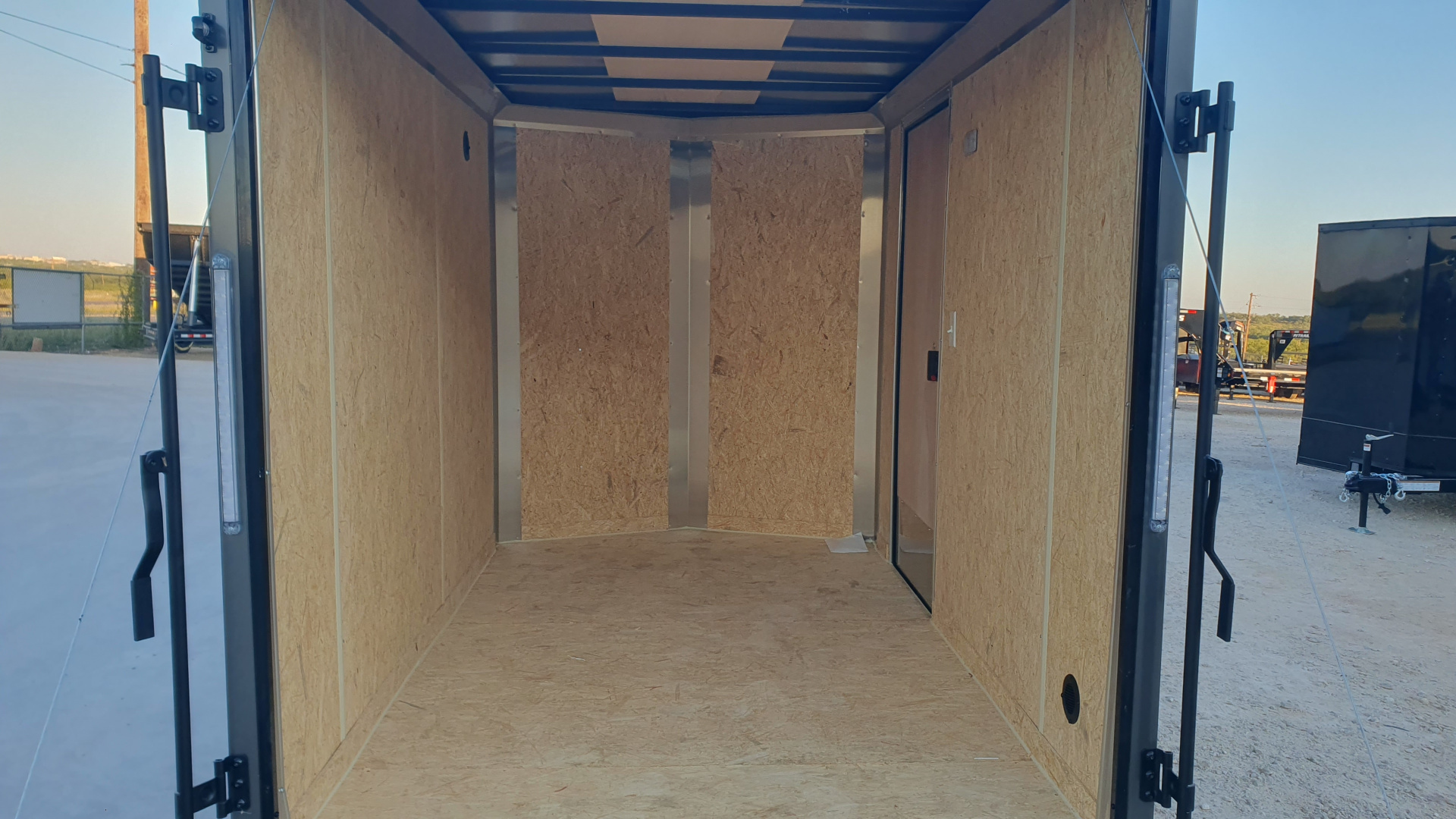 New 2026 Compass 6'x10' Enclosed Cargo Trailer - Indigo DLX