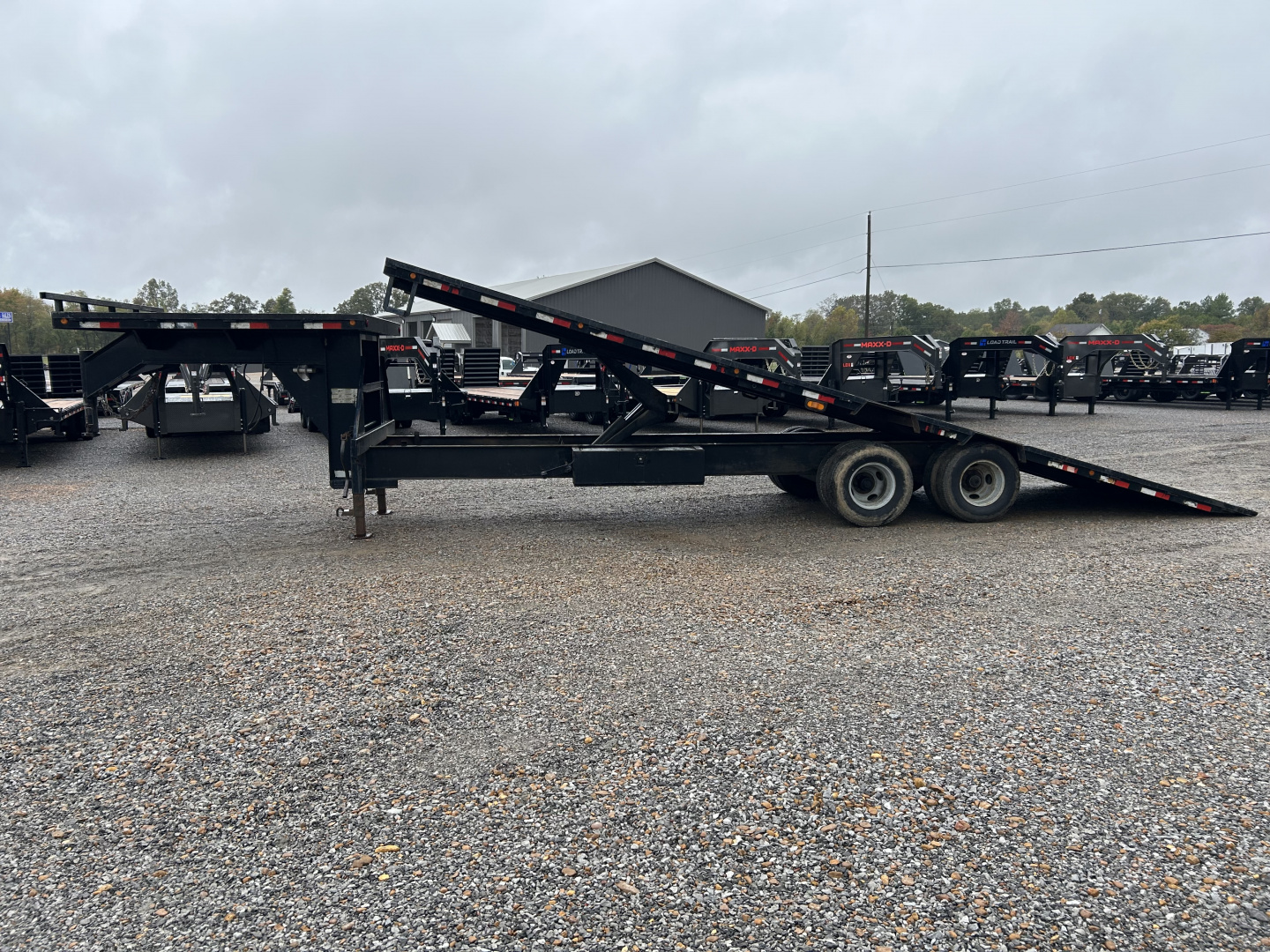Used 2006 Load Trail 102"x28' 20k Gooseneck Tilt Flatbed Trailer
