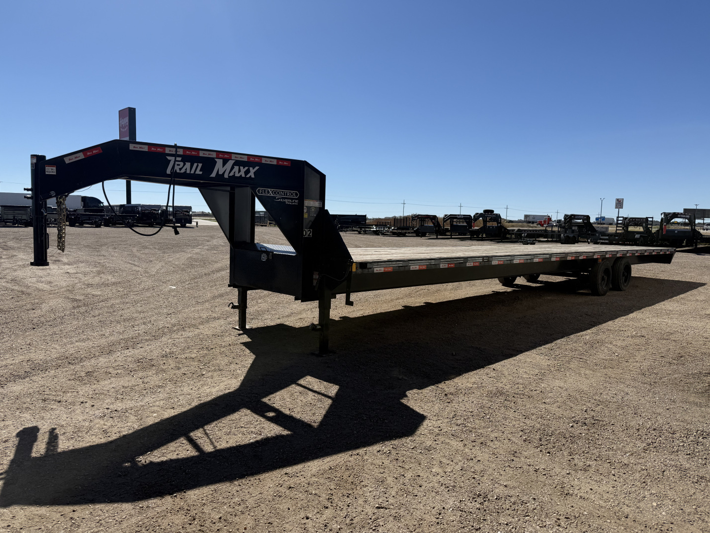 Used 2024 Trail Maxx 102"x40' GN Low-Pro Flatbed w/ Singles