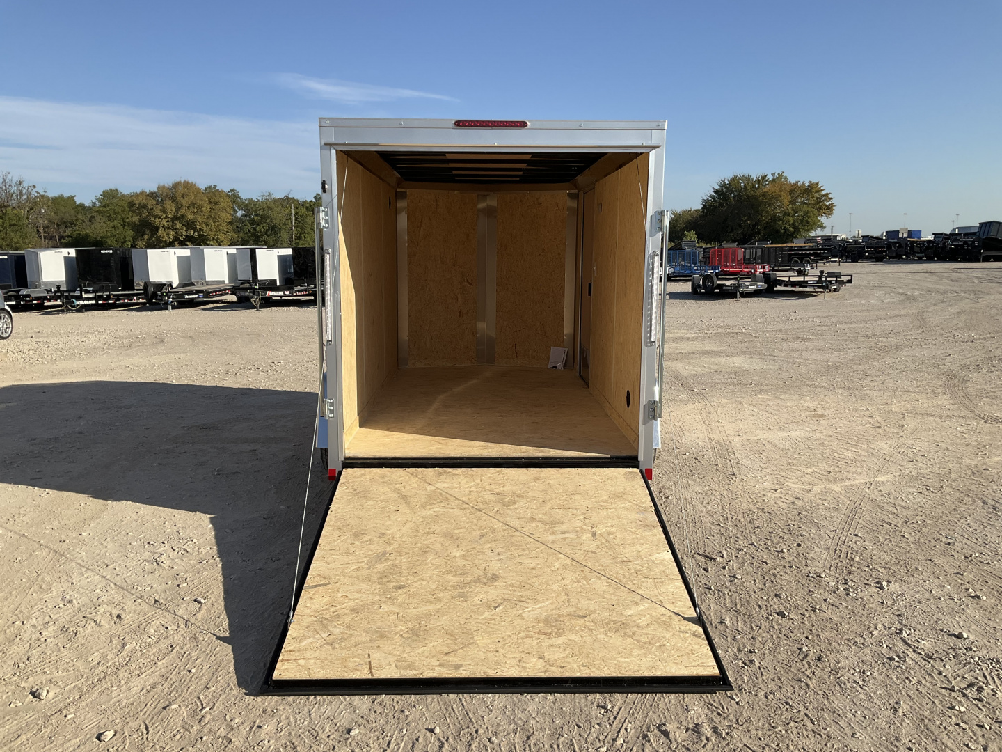 New 2026 Compass 6'x12' Enclosed Cargo Trailer - Indigo DLX