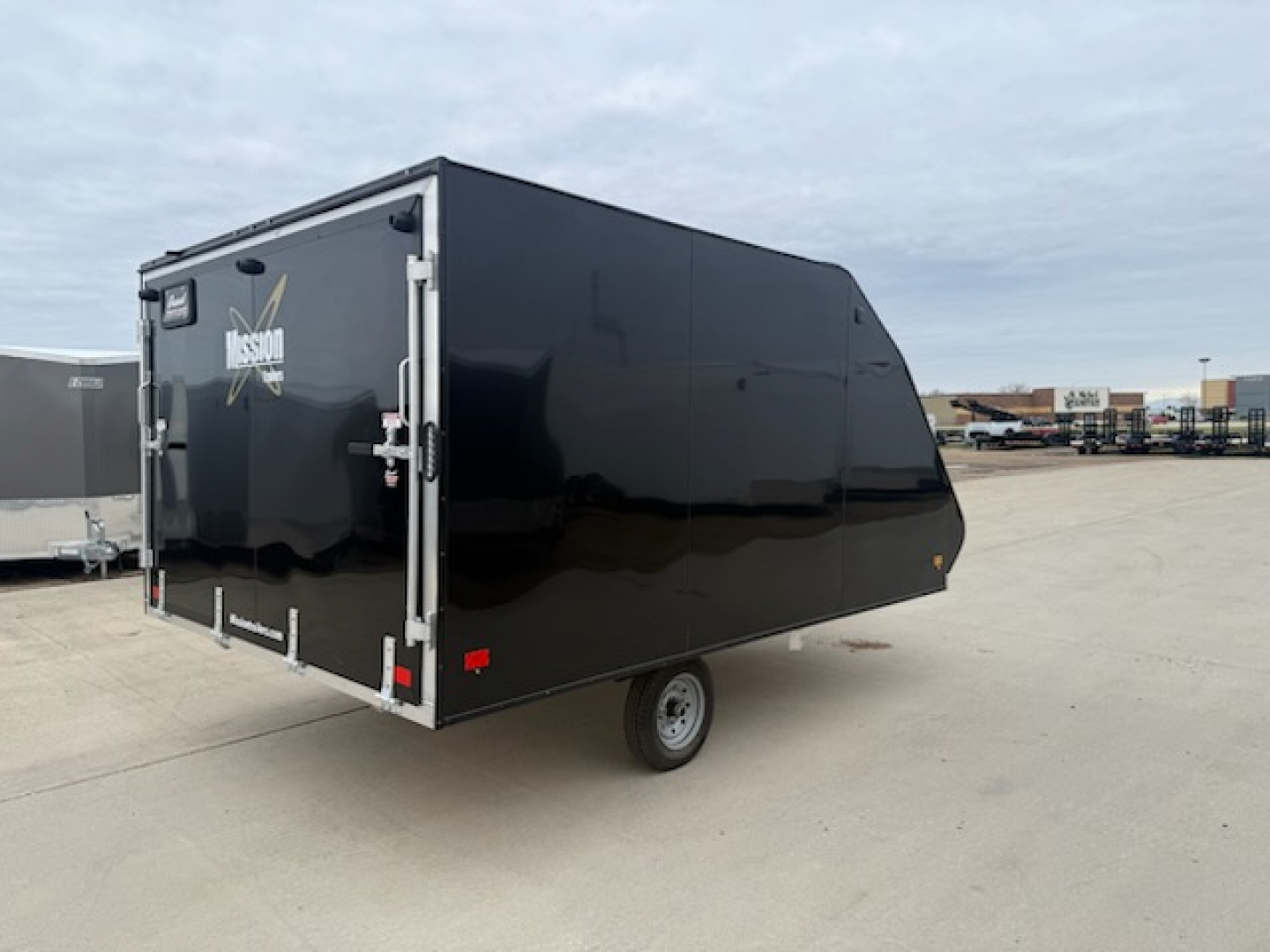 New 2026 Mission MFS 101x12 Crossover Enclosed Snowmobile Trailer