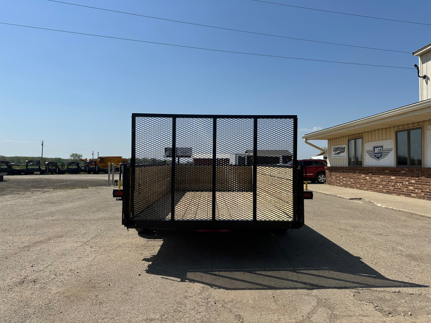New 2026 AMO 76x12 Wood Side 3K Utility Trailer