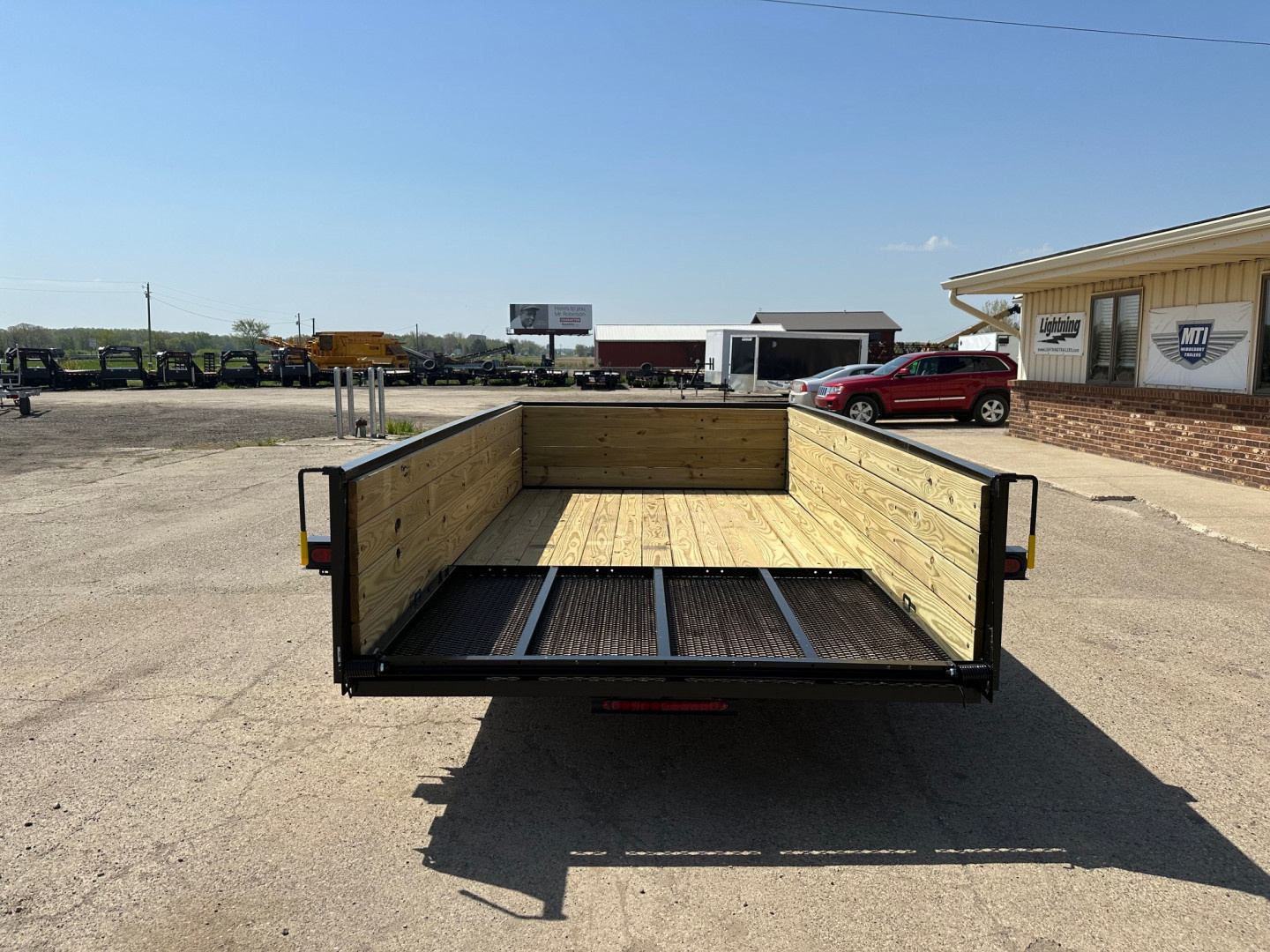 New 2026 AMO 76x12 Wood Side 3K Utility Trailer