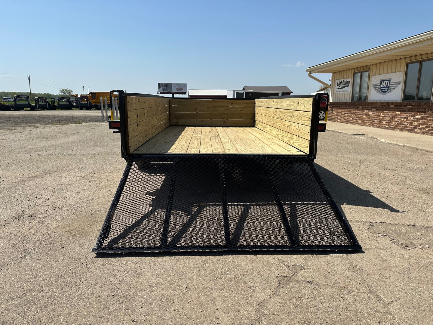 New 2026 AMO 76x12 Wood Side 3K Utility Trailer