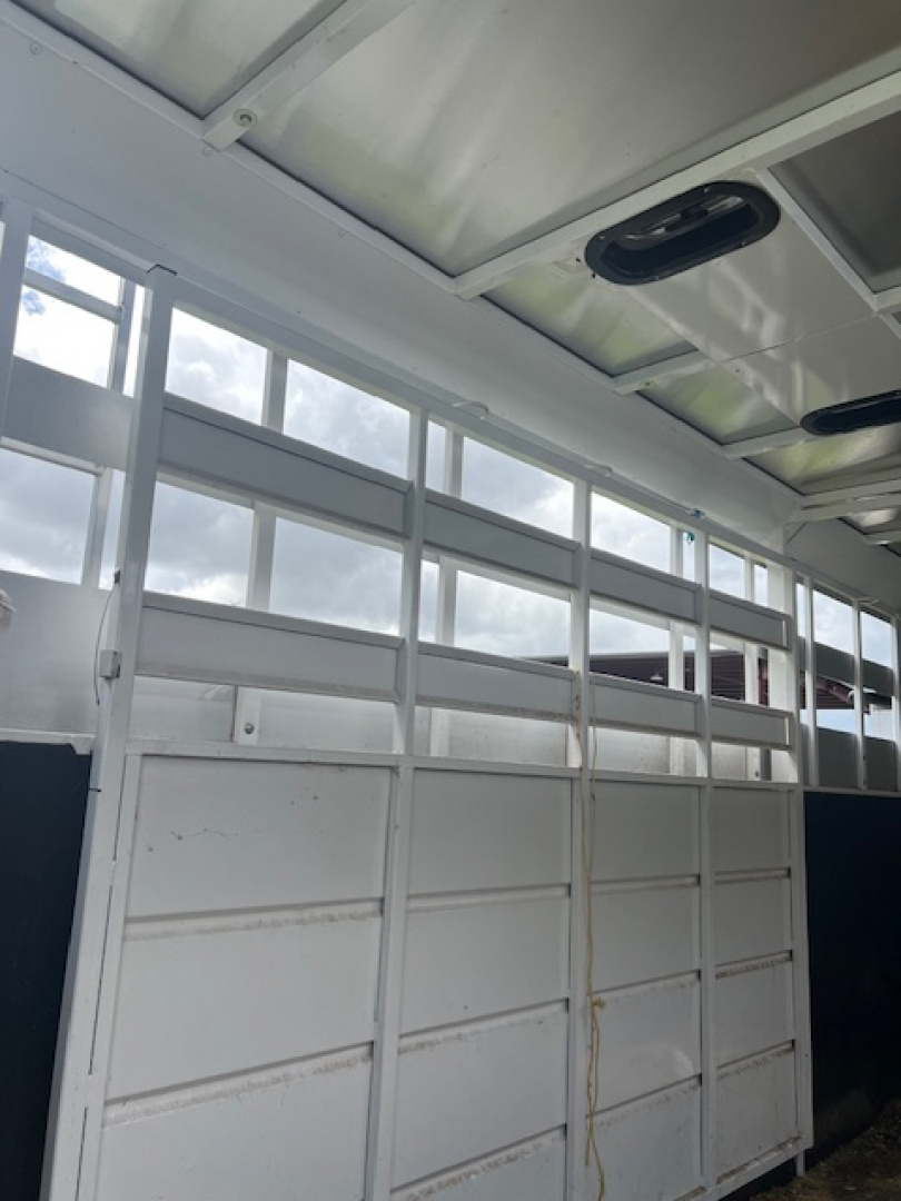 Used 2023 Trails West Santa Fe 12'lq w/midtack and stock area Stock / Stock Combo Trailer