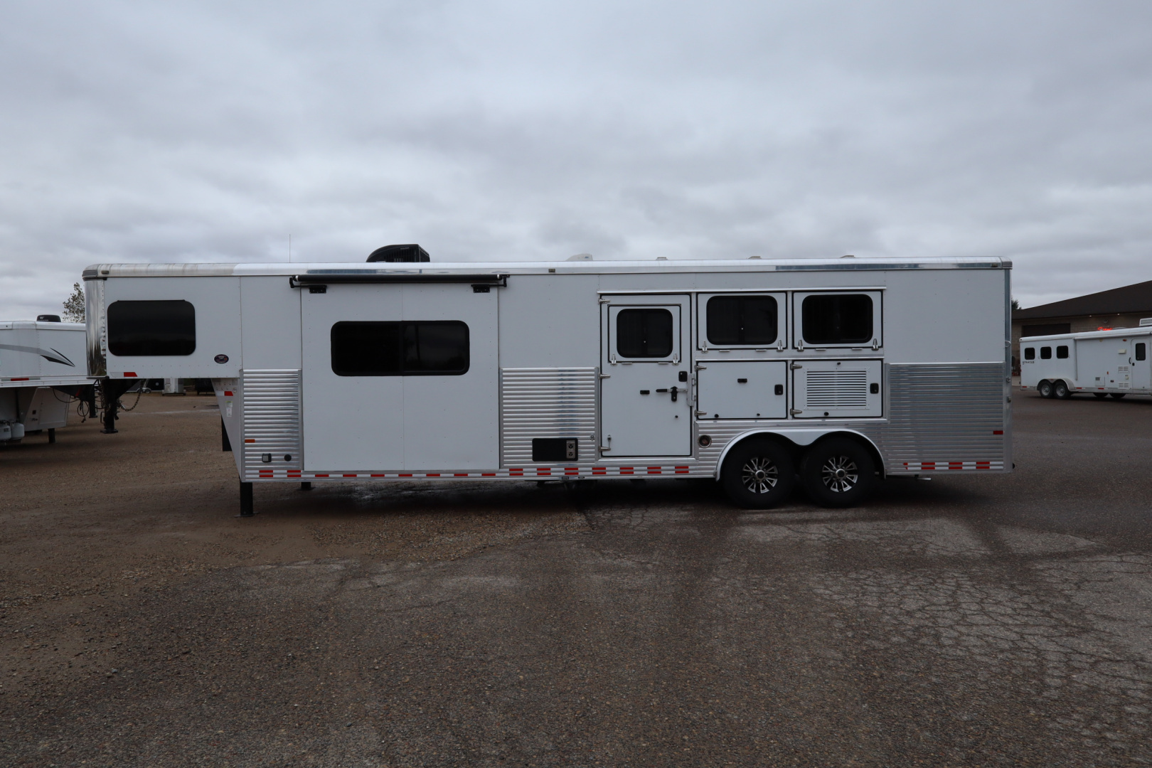 Used 2016 Sundowner 3 Horse LQ W/Slide-out Horse Trailer