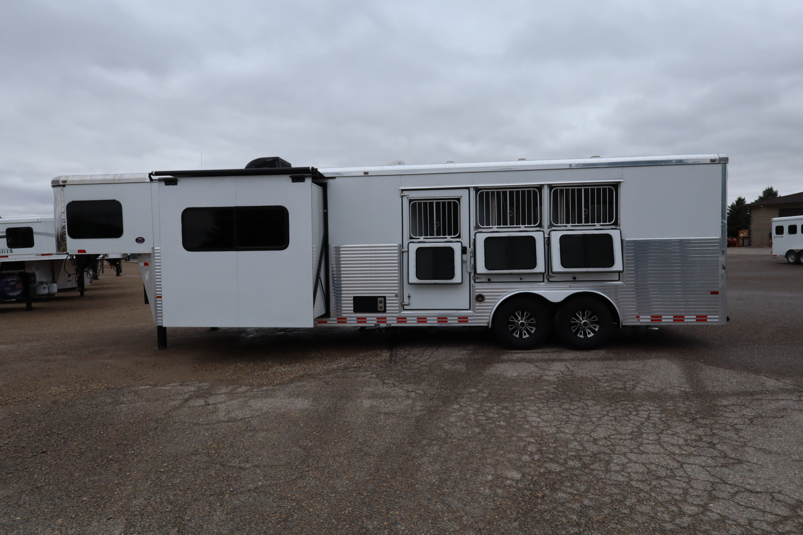 Used 2016 Sundowner 3 Horse LQ W/Slide-out Horse Trailer