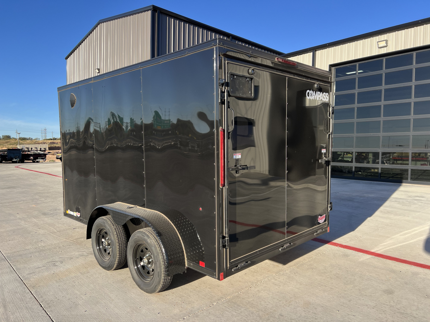 New 2026 Compass 7'x12' Enclosed Cargo Trailer - Indigo DLX