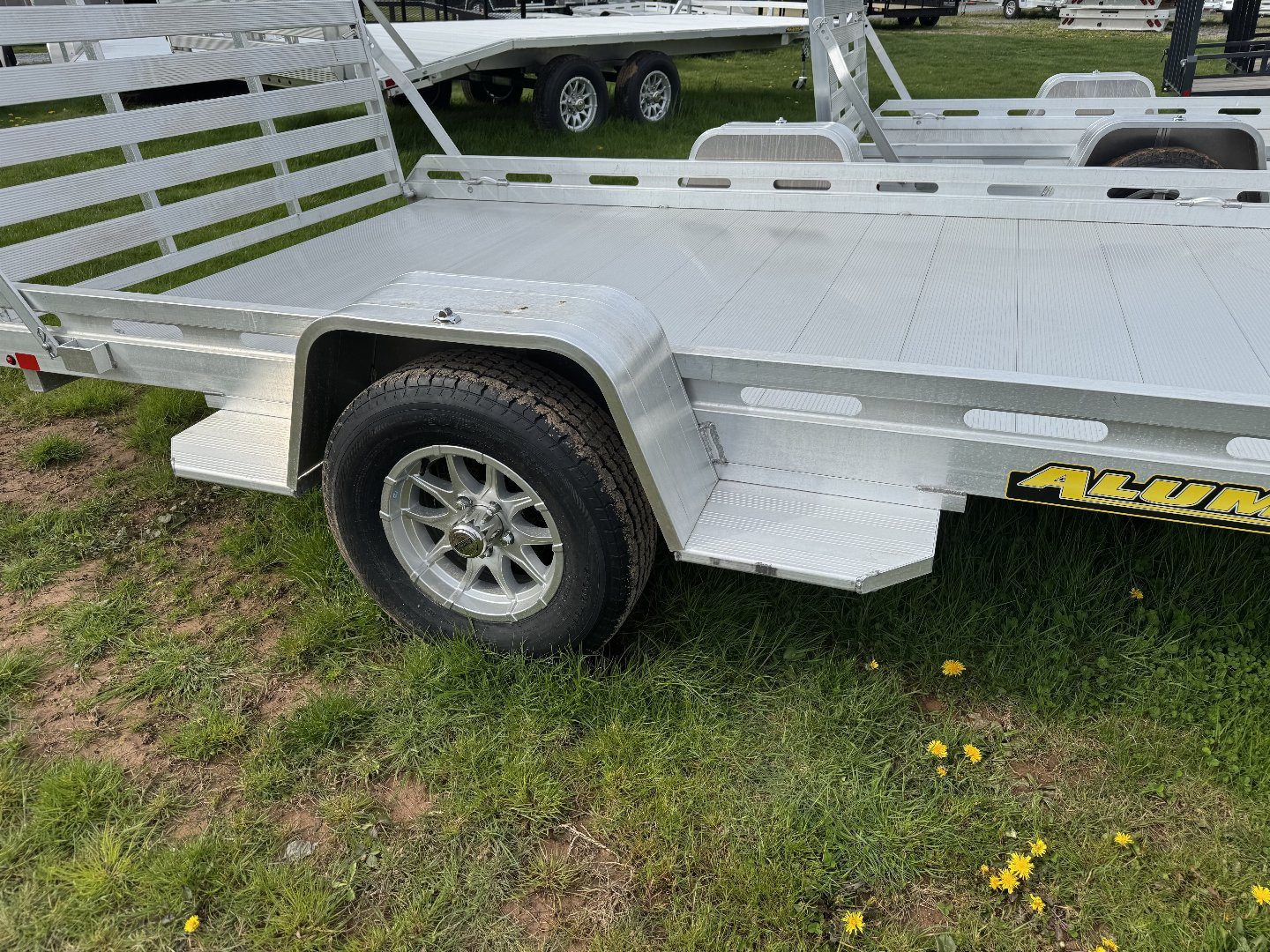 New 2026 Aluma 7712H-S-TG One Piece Gate Utility Trailer