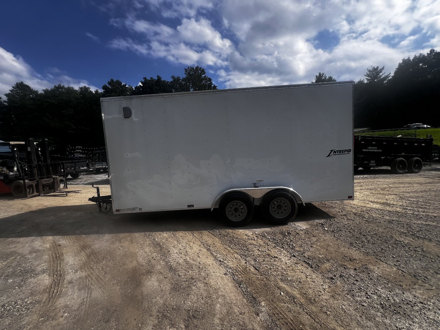 New 2026 HOMESTEADER CARGO TRAILER / INTREPID SERIES / 7'X16' / 7' INTERIOR HEIGHT / 32" SIDE DOOR / RAMPS REAR DOOR / .030 WHITE ALUMINUM