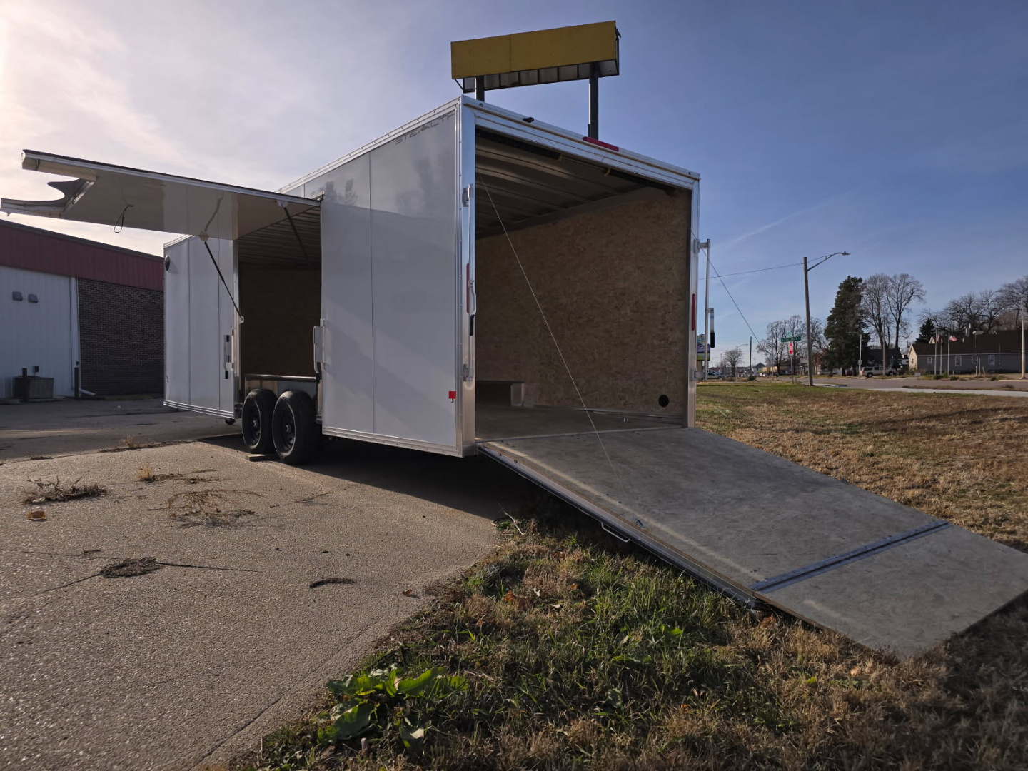 New 2026 ALCOM 8.5x24 with Elite door and extra wall height Cargo / Enclosed Trailer