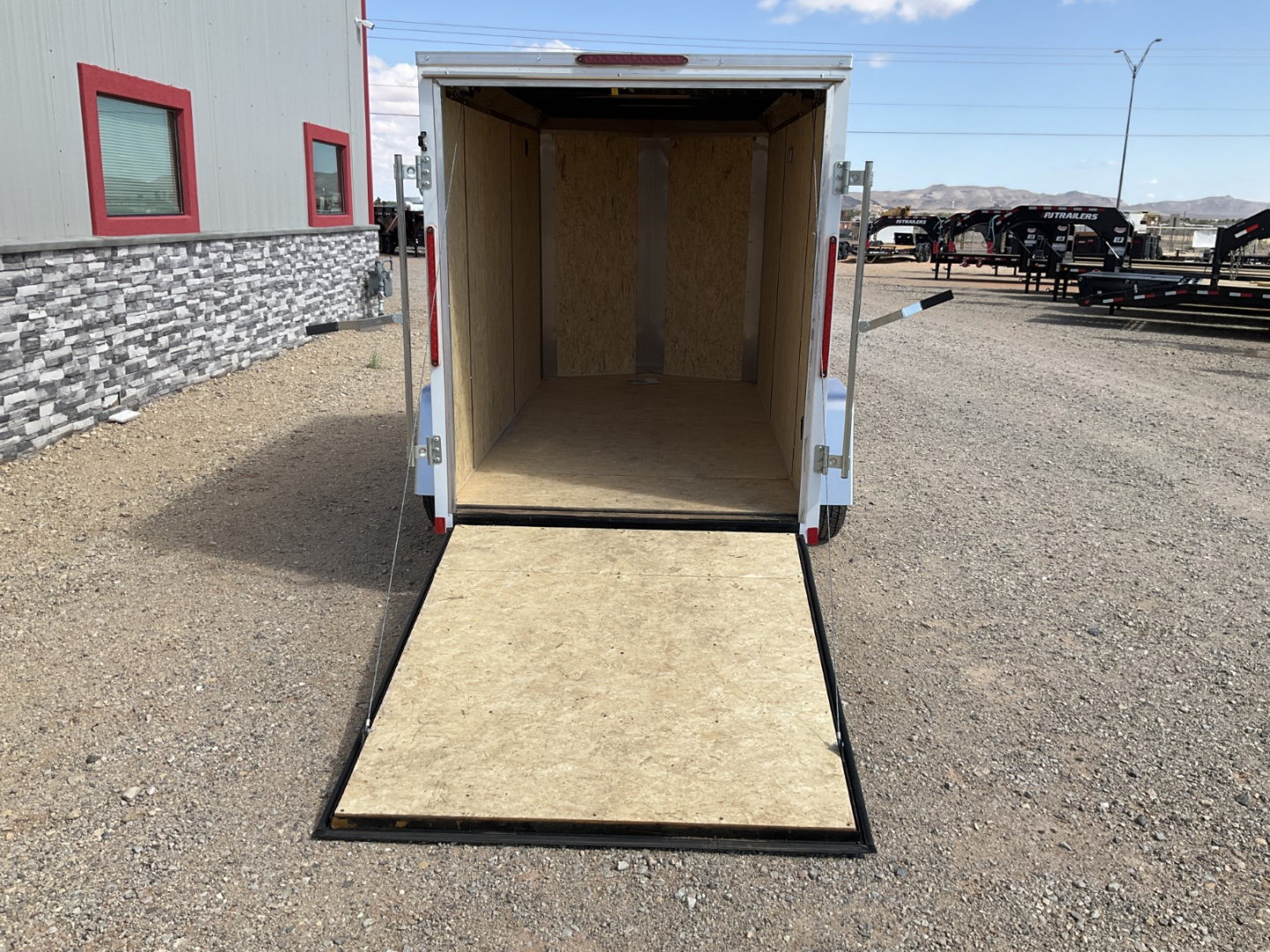 New 2026 Compass 5'x10' Enclosed Cargo Trailer - Indigo DLX