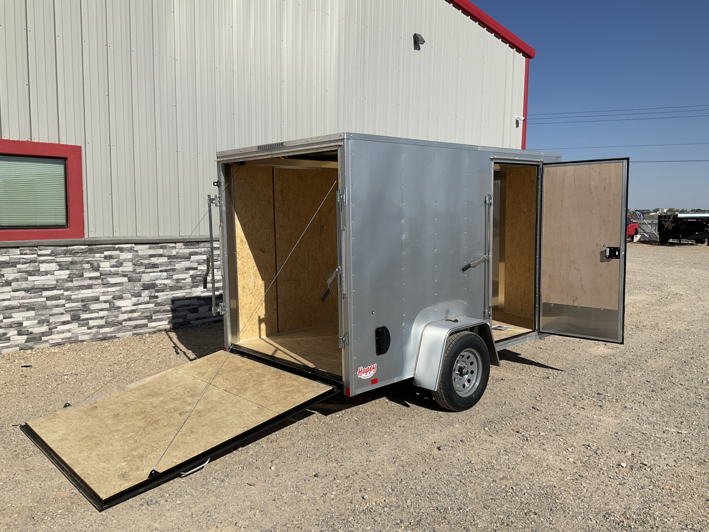 New 2026 Compass 6'x10' Enclosed Cargo Trailer - Indigo DLX