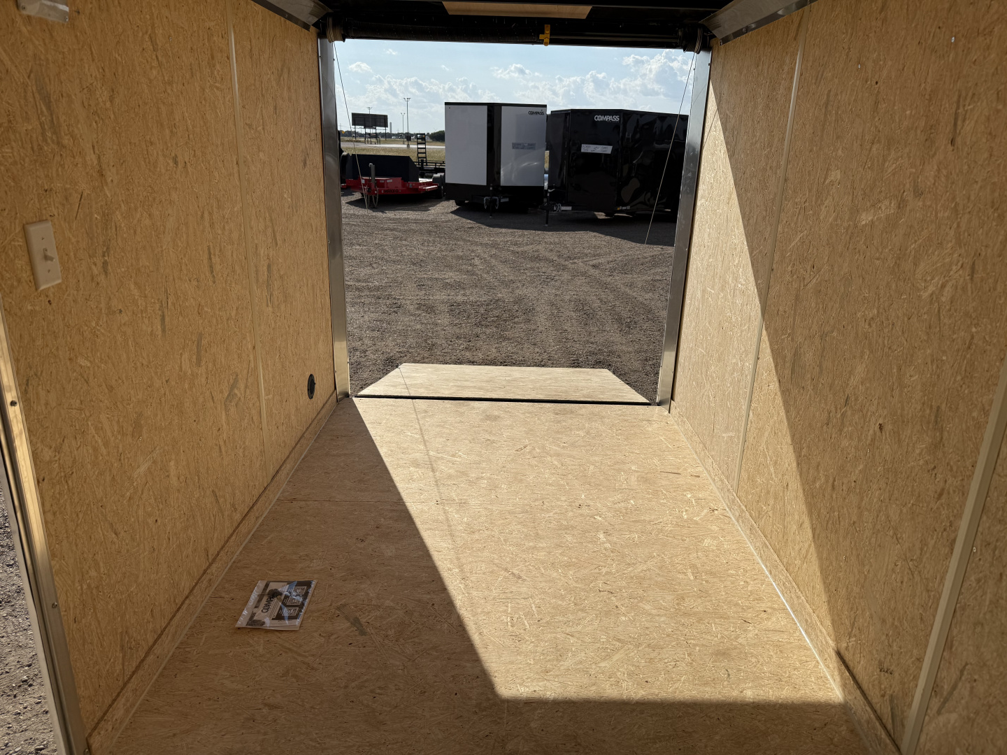 New 2026 Compass 6'x12' Enclosed Cargo Trailer - Indigo DLX