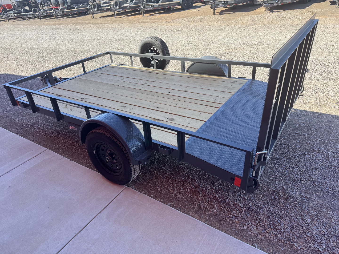 New 2026 Lamar Trailers 83X12 UC S/A FOLD-IN GATE Utility Trailer