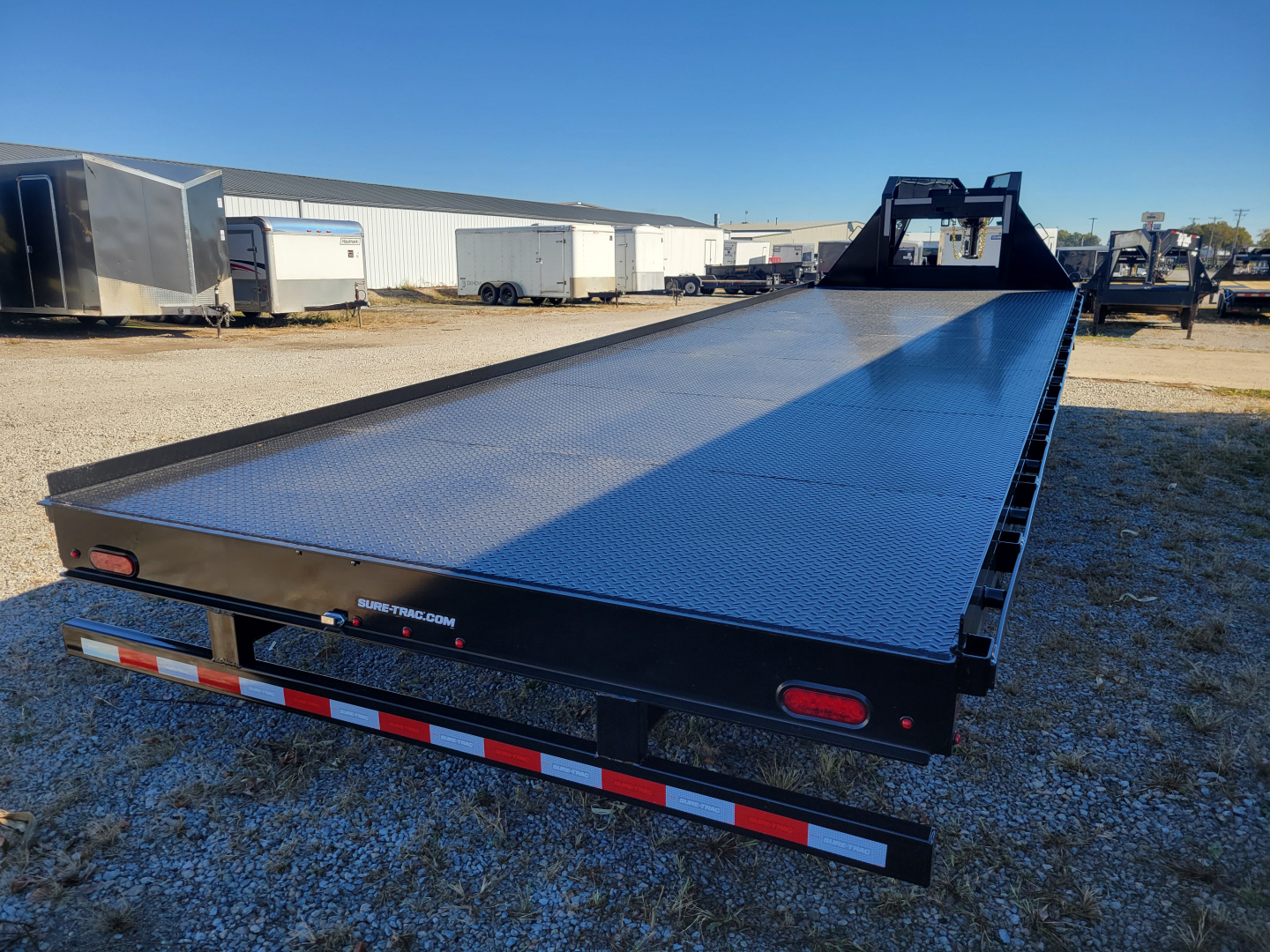 New 2026 Sure-Trac 8.5x28 HD Low Profile Deckover Flatbed Trailer
