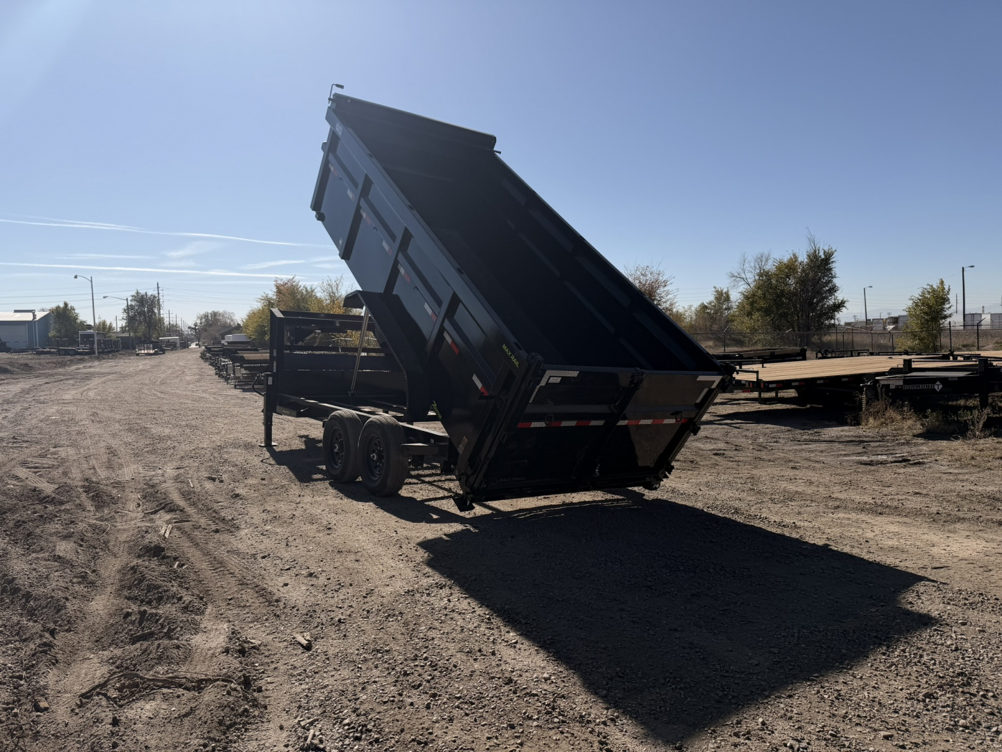 New 2026 Load Trail 7-16-4H Telescopic Gooseneck Dump 7K Axles