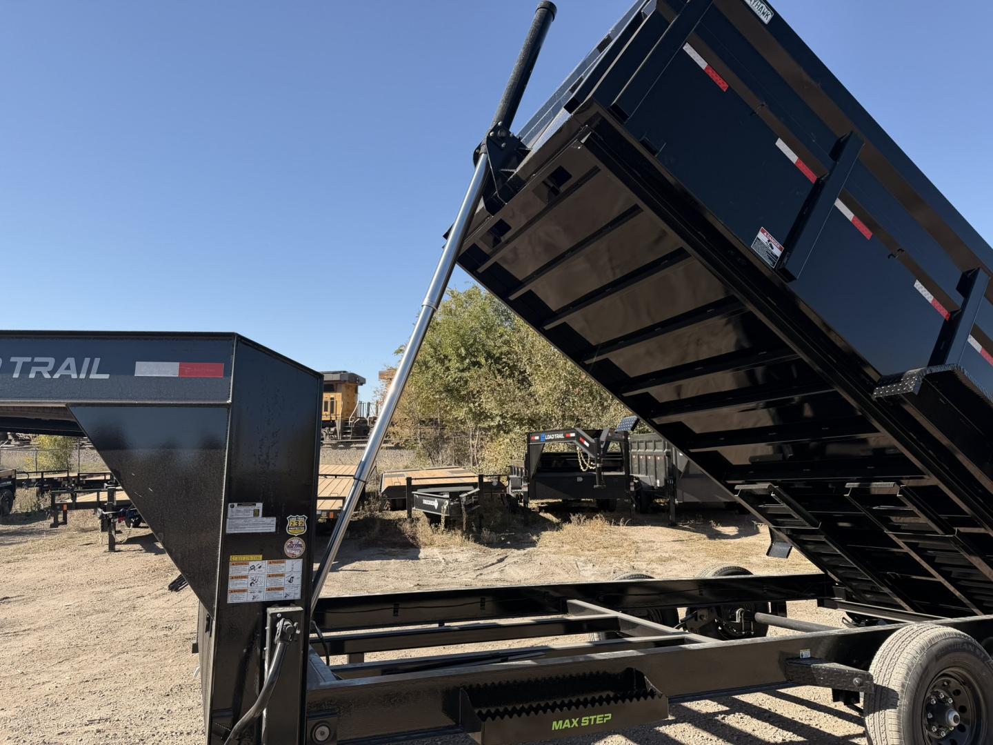 New 2026 Load Trail 7-16-4H Telescopic Gooseneck Dump 7K Axles