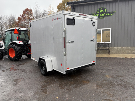 New 2026 WELLS CARGO 6x10 6'6" Interior Height Fasttrac Deluxe Cargo / Enclosed Trailer w/Ramp Door