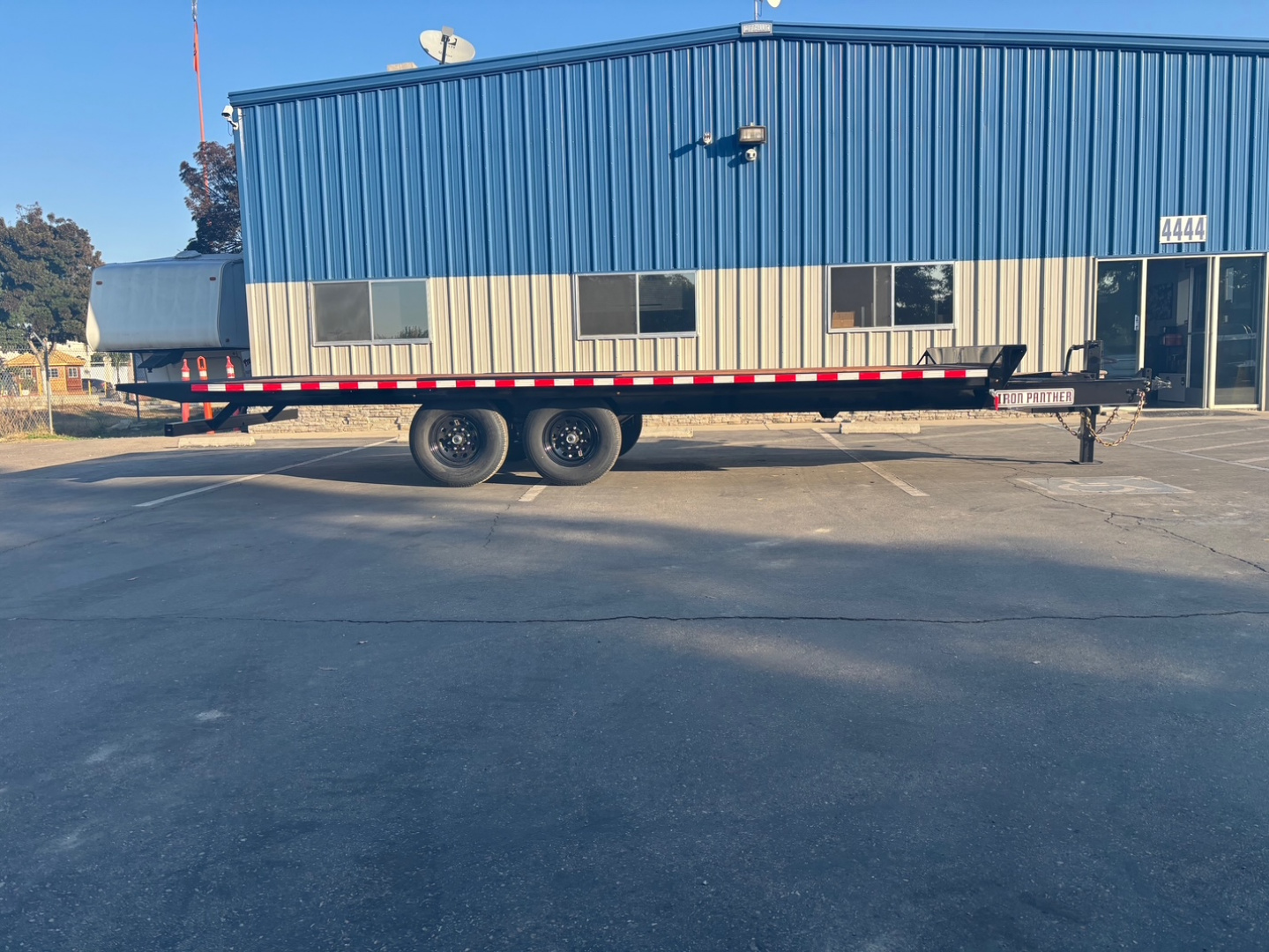 New 2025 Iron Panther 8.5x20' Power Tilt Equipment Trailer 14k