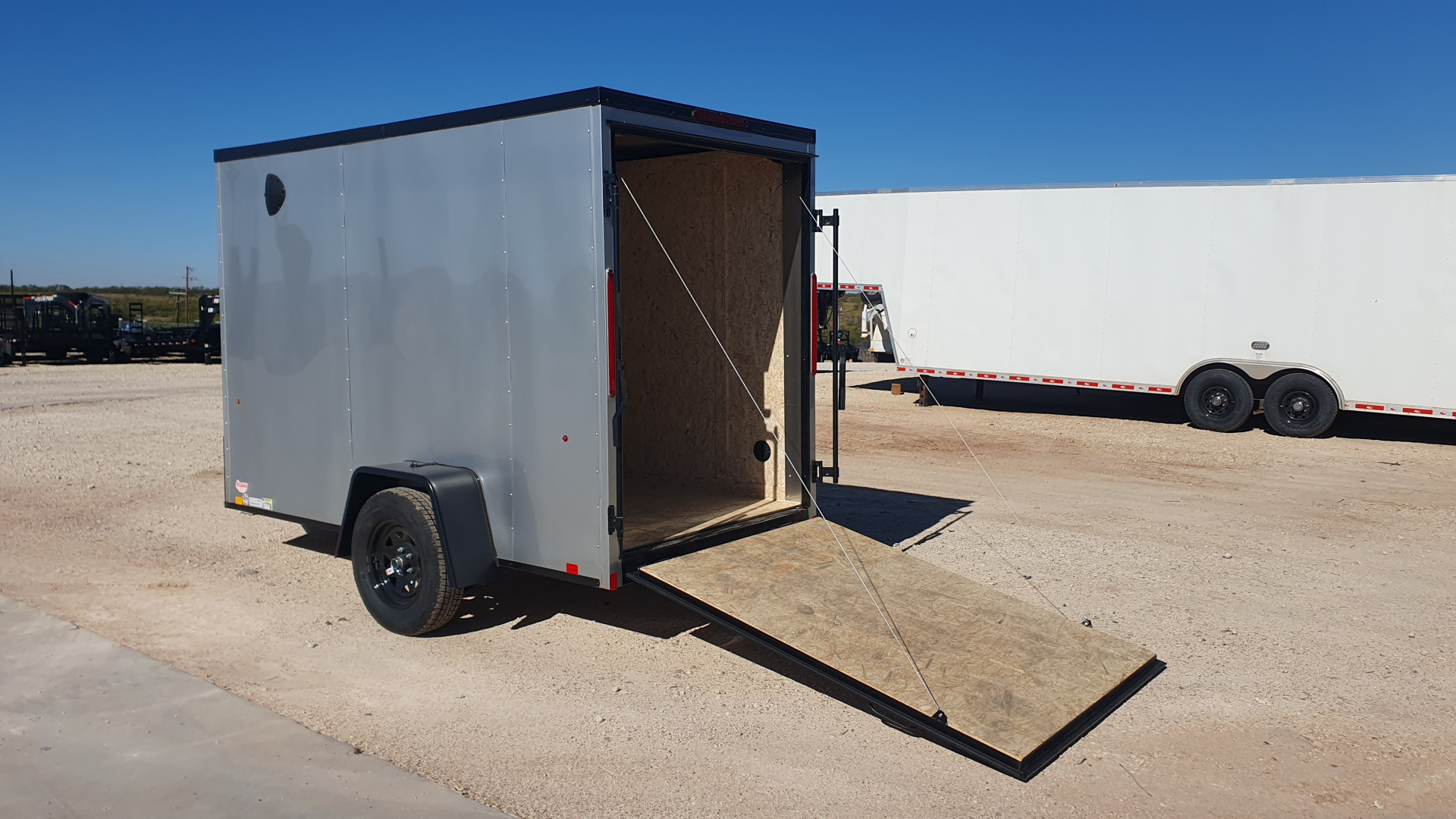 New 2026 Compass 5'x10' Enclosed Cargo Trailer - Indigo DLX