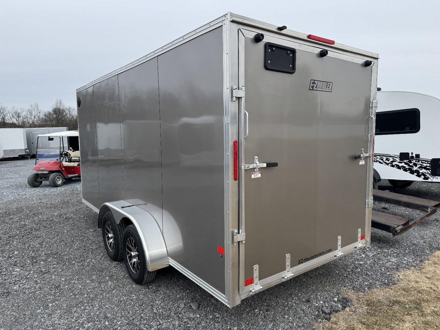 New 2026 E-Z Hauler XLT PRO 7x14 Tandem Axle Enclosed 6'9" Interior Height 7000 LB GVW Cargo / Enclosed Trailer Extra Height Free Aluminum Wheel Upgrade