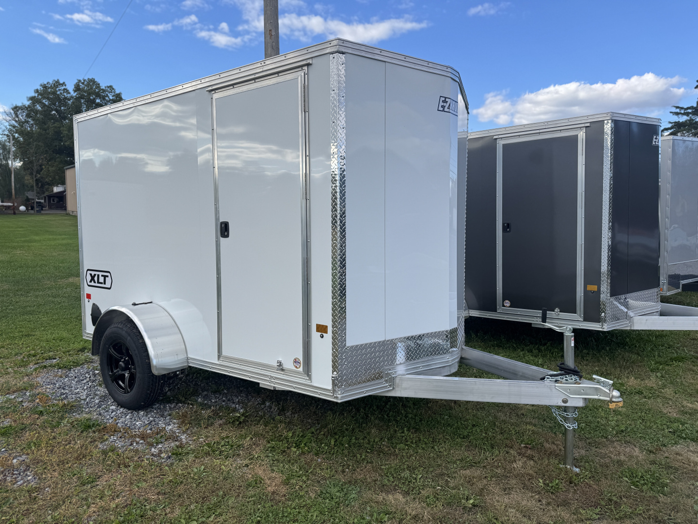 New 2026 E-Z Hauler XLT PRO 6x10 Single Axle Enclosed 6'4" Interior Height 2990 LB Cargo / Enclosed Trailer EXTRA HEIGHT FREE ALUMINUM WHEEL UPGRADE