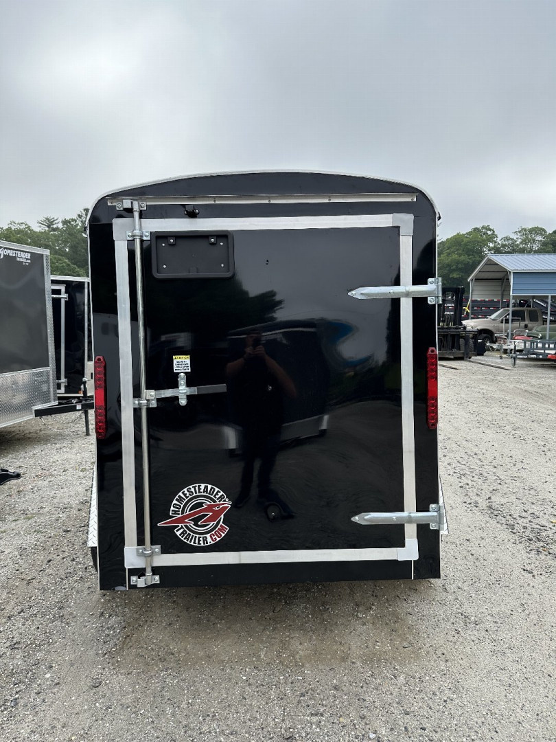 New 2026 Homesteader Trailer / Challenger Series / 5x8 / 5'7" Interior Height / Single Swing Rear Door / 32" Side Door / 24" Stoneguard / .030 Black Aluminum