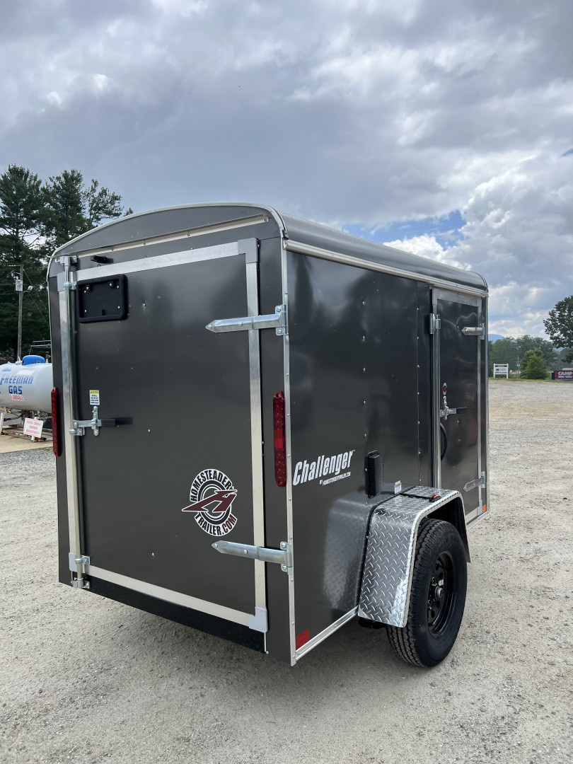 New 2026 Homesteader Trailer / Challenger Series / 5x8 / 5'7" Interior Height / Single Swing Rear Door / 32" Side Door / 24" Stoneguard / .030 Charcoal Gray Aluminum