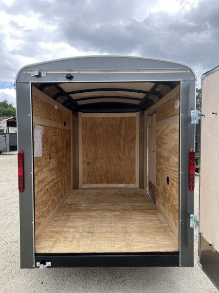 New 2026 Homesteader Trailer / Challenger Series / 5x8 / 5'7" Interior Height / Single Swing Rear Door / 32" Side Door / 24" Stoneguard / .030 Charcoal Gray Aluminum