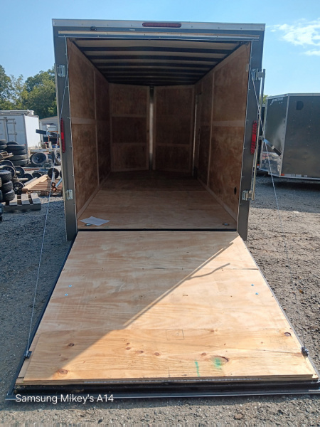 New 2026 HOMESTEADER CARGO TRAILER / INTREPID SERIES / 7'X16' / 7' INTERIOR HEIGHT / 32" SIDE DOOR W/ RV LOCK / RAMPS REAR DOOR / .030 CHARCOAL GRAY ALUMINUM