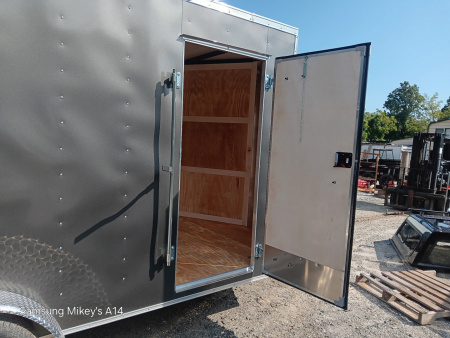 New 2026 HOMESTEADER CARGO TRAILER / INTREPID SERIES / 7'X16' / 7' INTERIOR HEIGHT / 32" SIDE DOOR W/ RV LOCK / RAMPS REAR DOOR / .030 CHARCOAL GRAY ALUMINUM