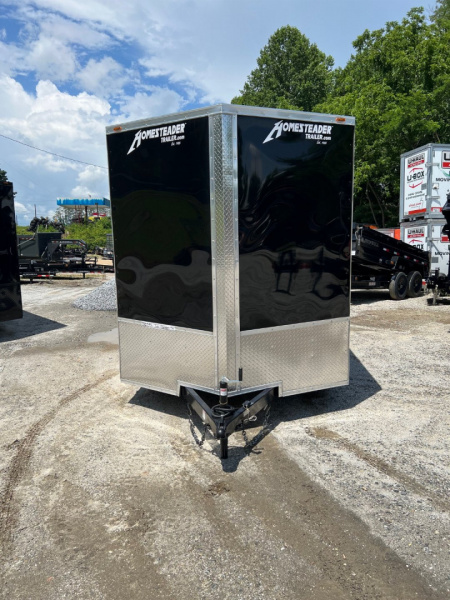 New 2026 HOMESTEADER CARGO TRAILER / INTREPID SERIES / 7'X16' / 7' INTERIOR HEIGHT / 32" SIDE DOOR W/ RV LOCK / RAMPS REAR DOOR / .030 BLACK ALUMINUM