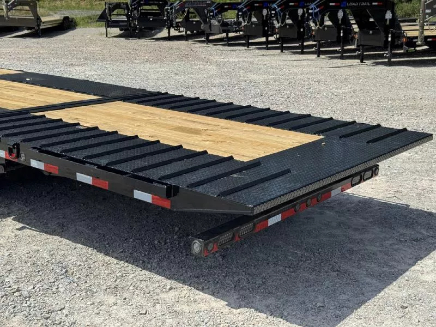 New 2025 Load Trail GL 102X36 HYDRAULIC DOVETAIL 10' CLEATED DOVE 25.9K GVWR HYDRAULIC JACKS  Flatbed Trailer