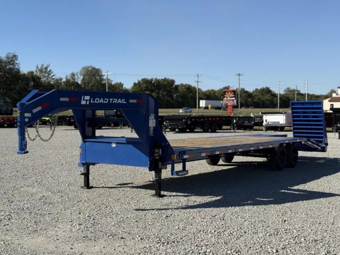 New 2026 Load Trail GP 102X30 W/MAX RAMPS, LOCKING CHAIN RACK, SLIDE TRACK, AND WORK LIGHTS 16K GVWR Flatbed Trailer