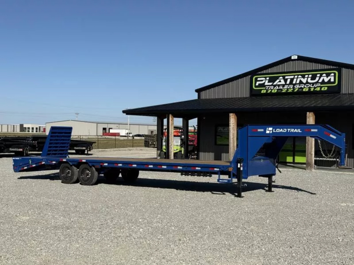 New 2026 Load Trail GP 102X30 W/MAX RAMPS, LOCKING CHAIN RACK, SLIDE TRACK, AND WORK LIGHTS 16K GVWR Flatbed Trailer