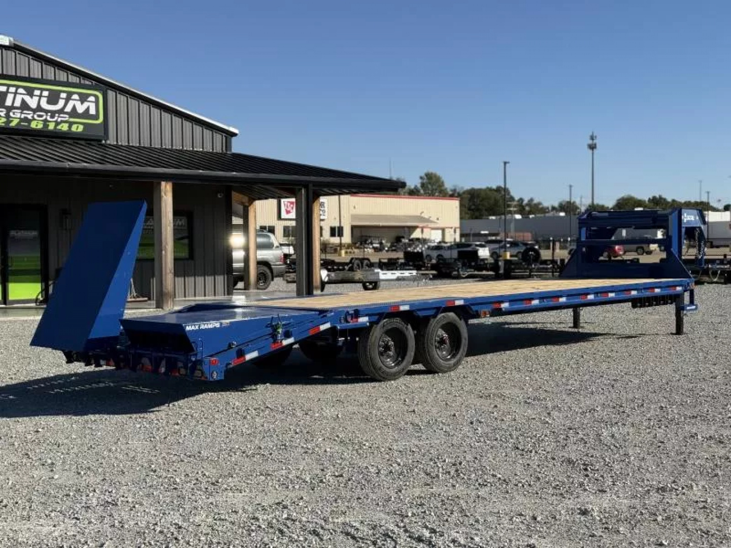New 2026 Load Trail GP 102X30 W/MAX RAMPS, LOCKING CHAIN RACK, SLIDE TRACK, AND WORK LIGHTS 16K GVWR Flatbed Trailer
