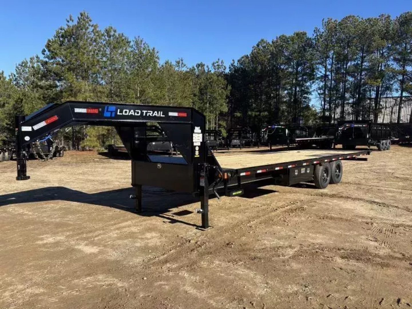 New 2025 Load Trail 102X28 14K GVWR WIRELESS FULL Tilt Trailer