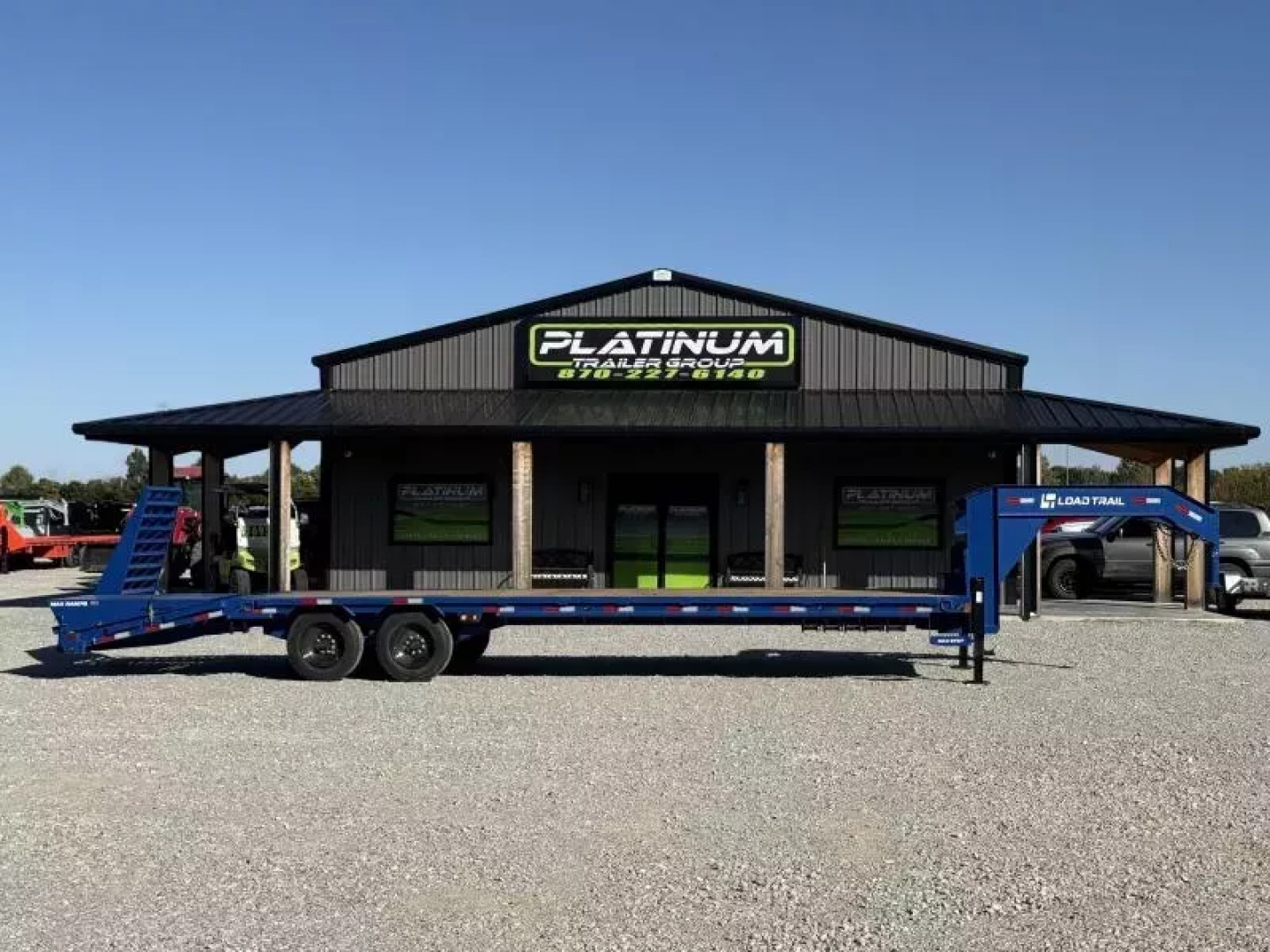 New 2026 Load Trail GP 102X30 W/MAX RAMPS, LOCKING CHAIN RACK, SLIDE TRACK, AND WORK LIGHTS 16K GVWR Flatbed Trailer