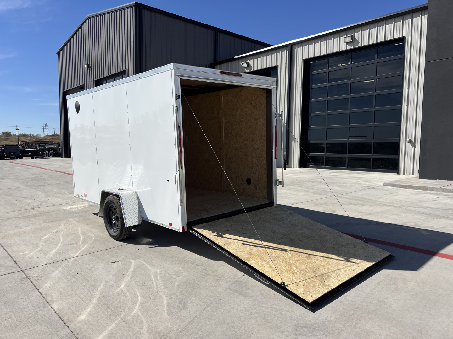 New 2026 Compass 6'x12' Enclosed Cargo Trailer - Indigo DLX