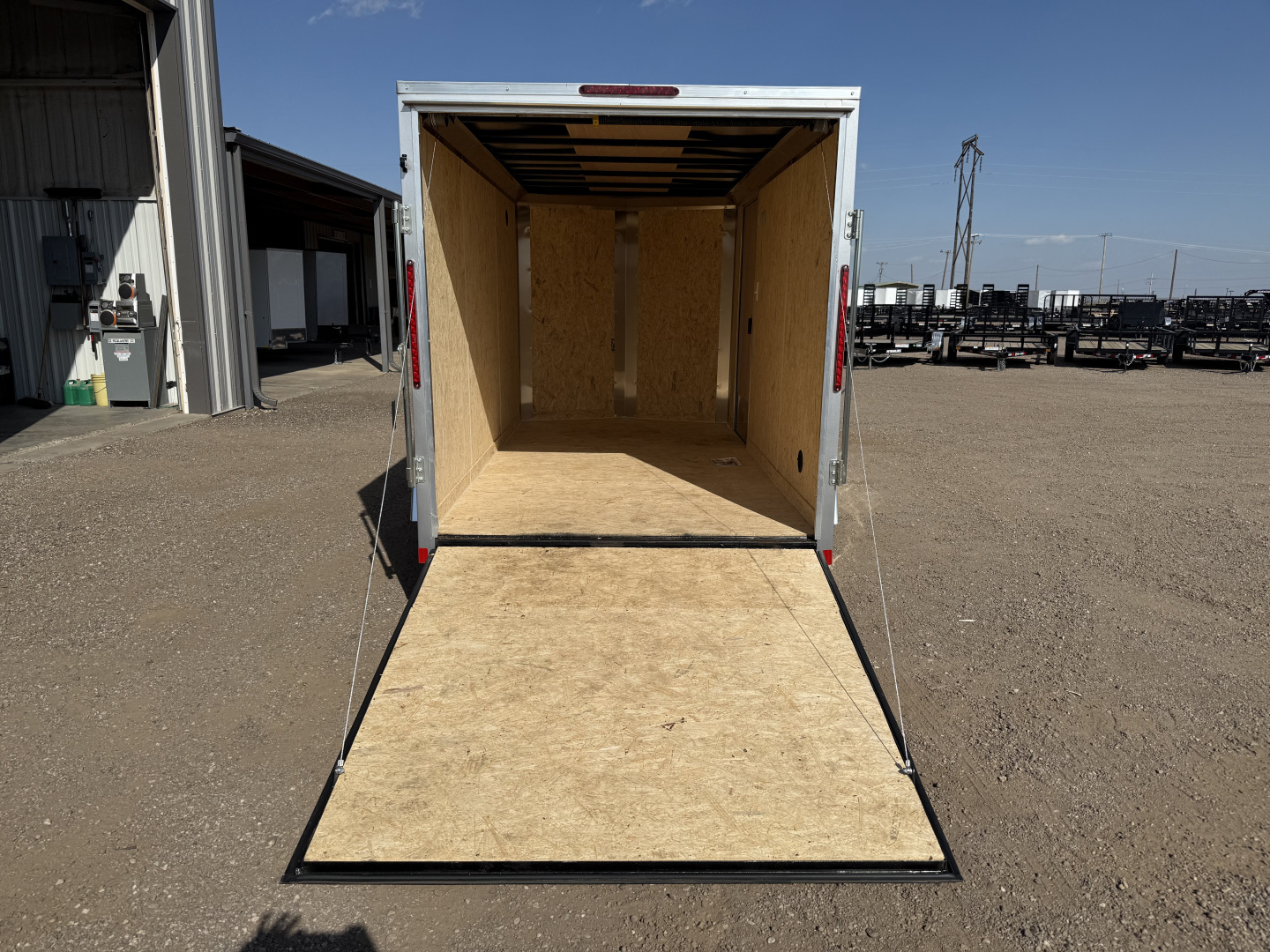 New 2026 Compass 6'x12' Enclosed Cargo Trailer - Indigo DLX