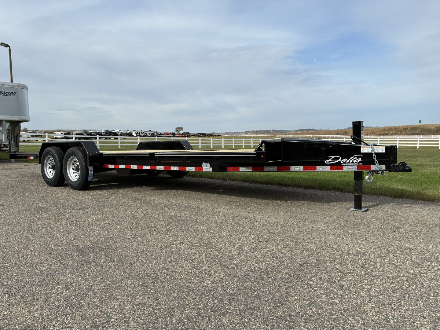 New 2026 Delta 27TB Bumper Tilt 22' Flatbed Trailer