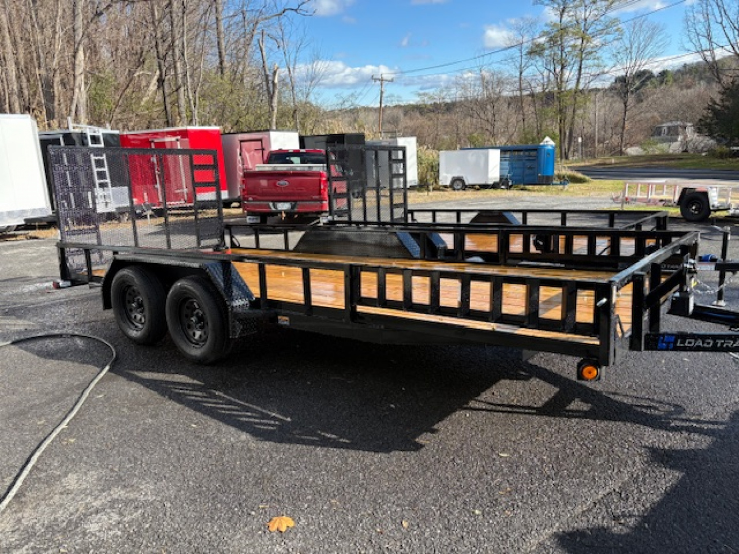 New 2026 LOAD TRAIL UE07 83" x 18' 7K GVW -- Tandem Axle Utility Trailer with Side Load Ramps